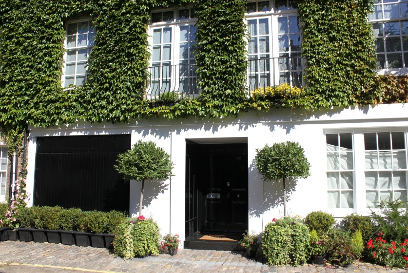 Potted greenery and mistletoe give the exterior of your period mews home a charming appearance and attract buyers