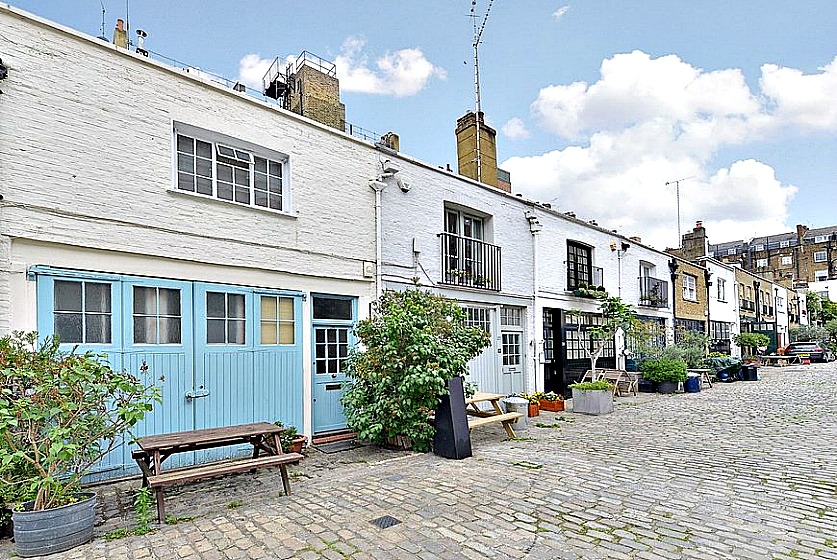 This two bedroom mews home in cobbled Bathurst mews near Hyde Park features exposed brickwork, beams and an interior design which maximises space and natural light