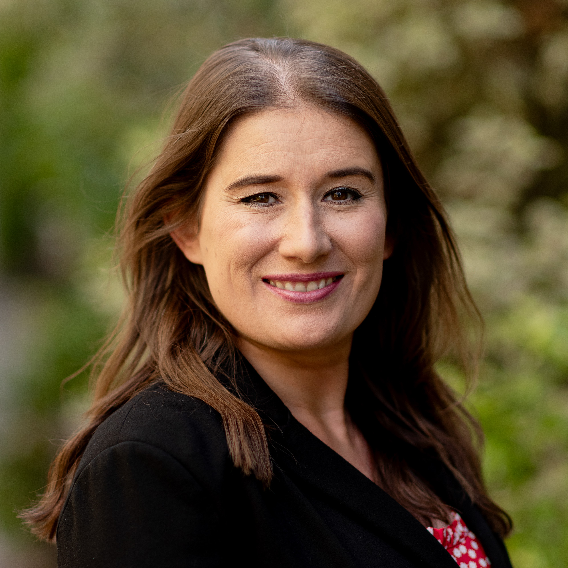 A picture of a female estate agent specialising in mews