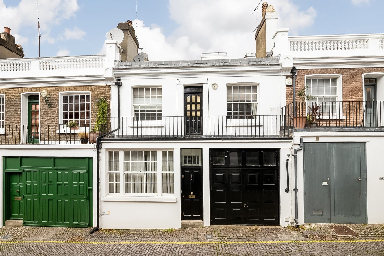 Charming Victorian terraced house in London with classic architecture and modern updates.