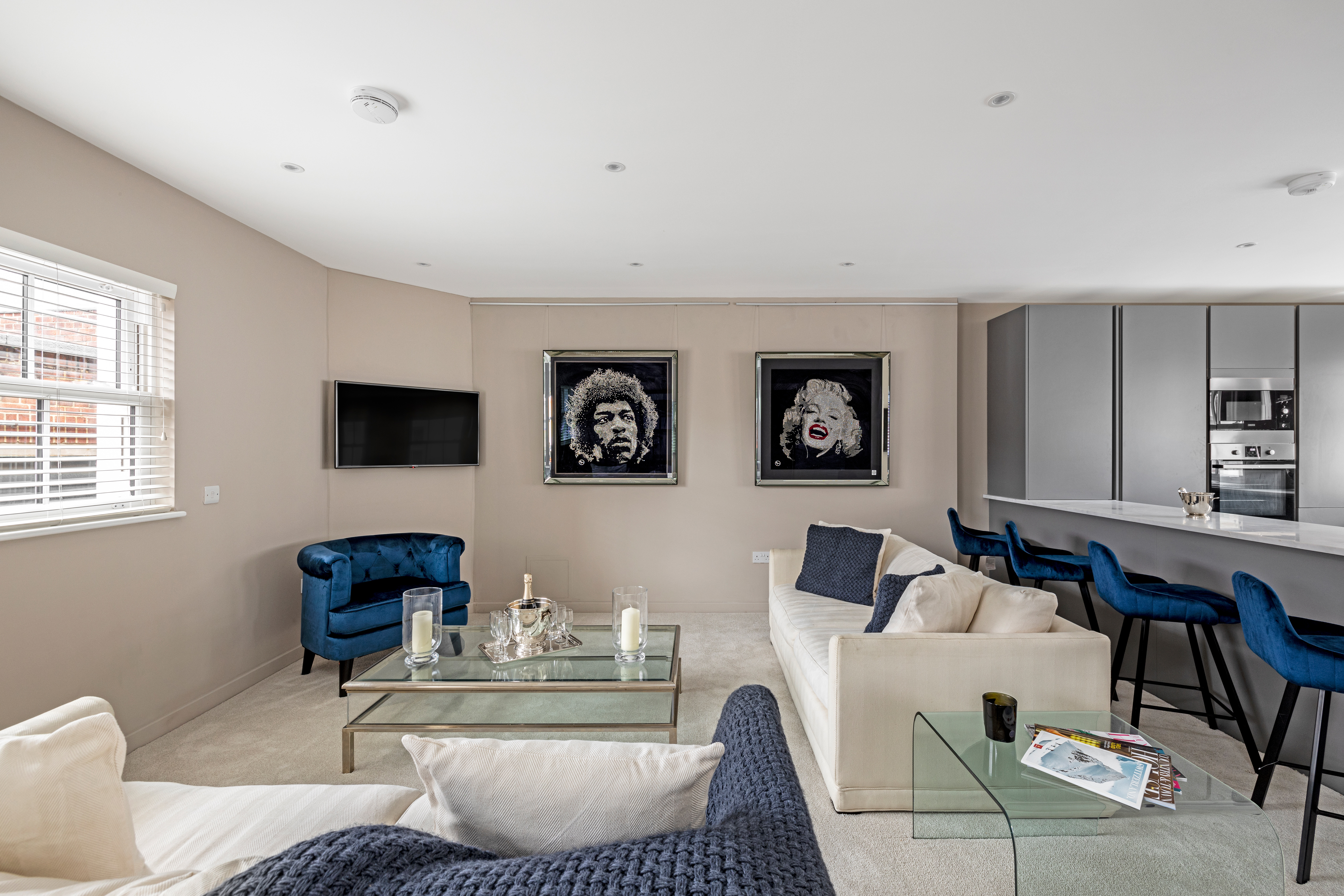 Living room with tv and sofa in a mews property