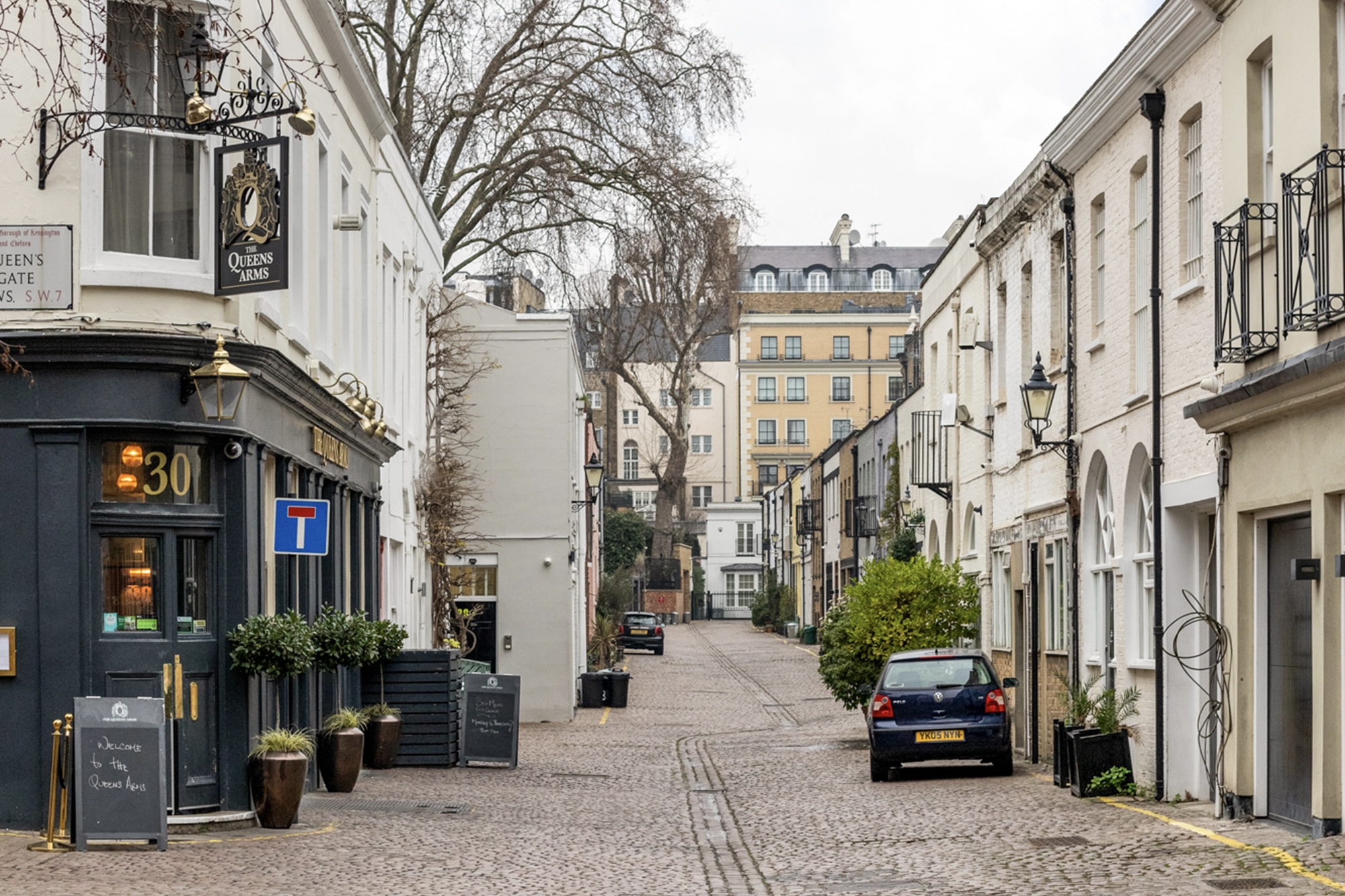 A mews street in London with a pub