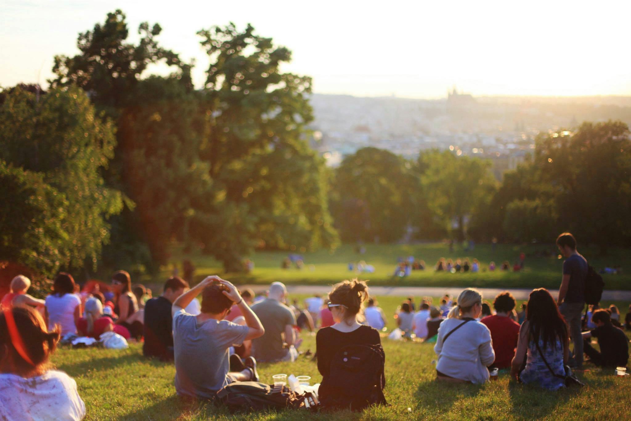 Hyde Park with people relaxing in the sunlight