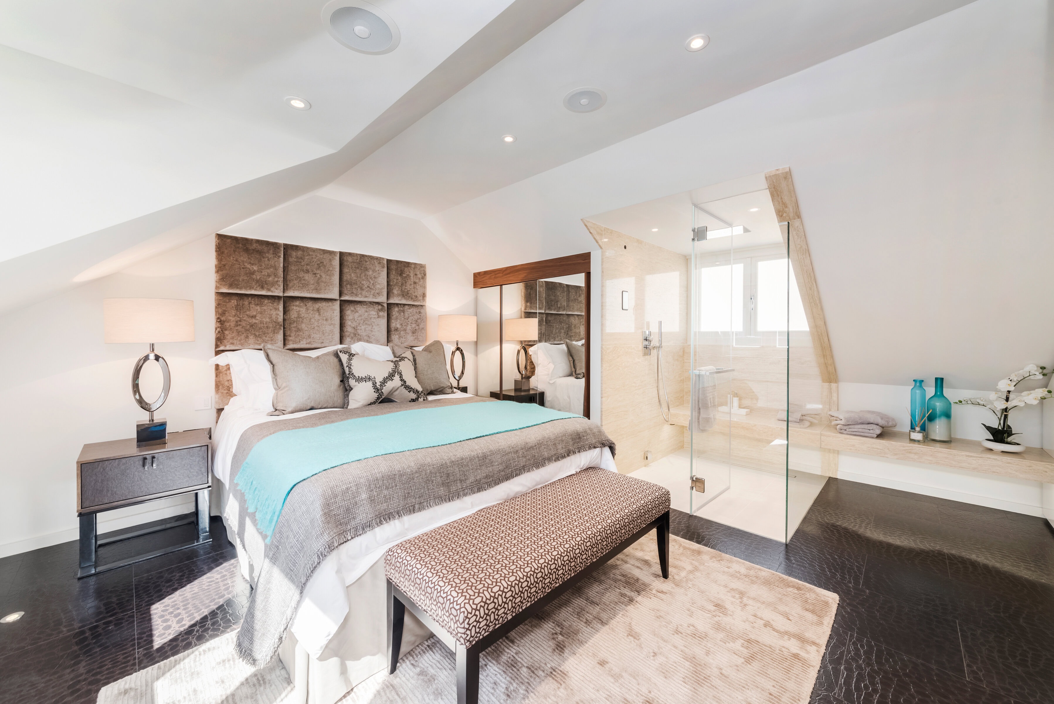 A spacious bedroom in a mews property with ensuite
