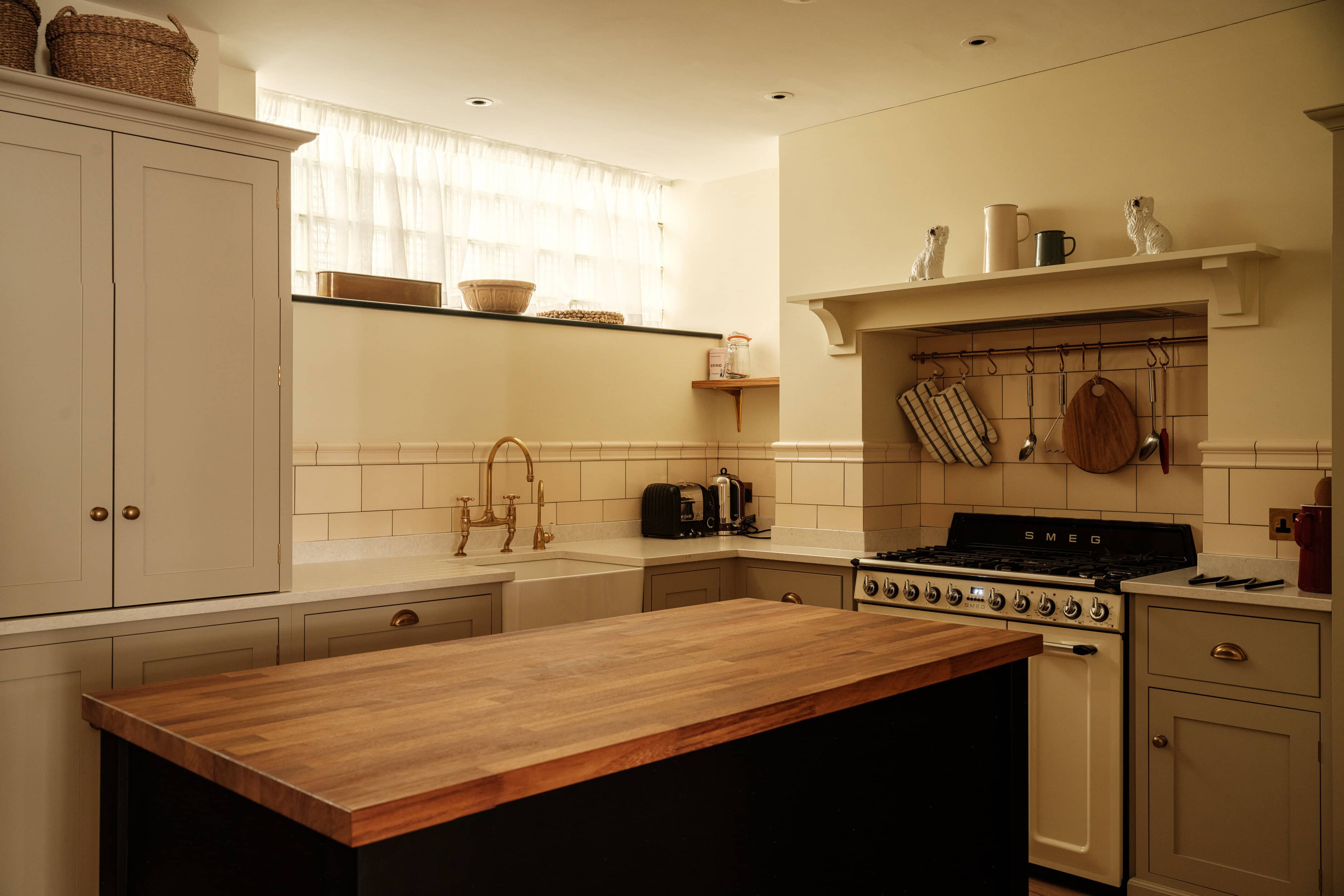 A kitchen with a wooden table