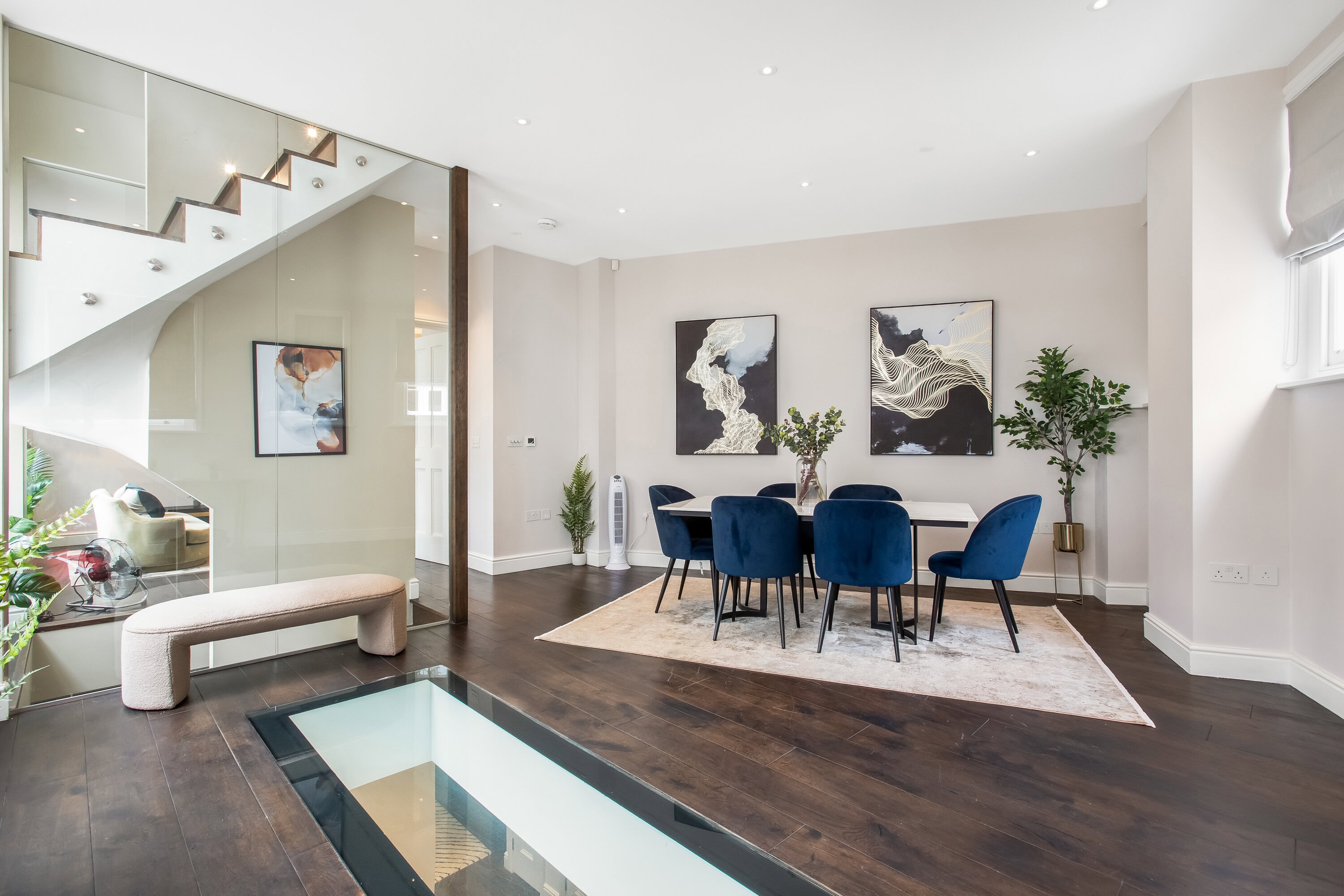 Dining room in a mews house with a glass floor