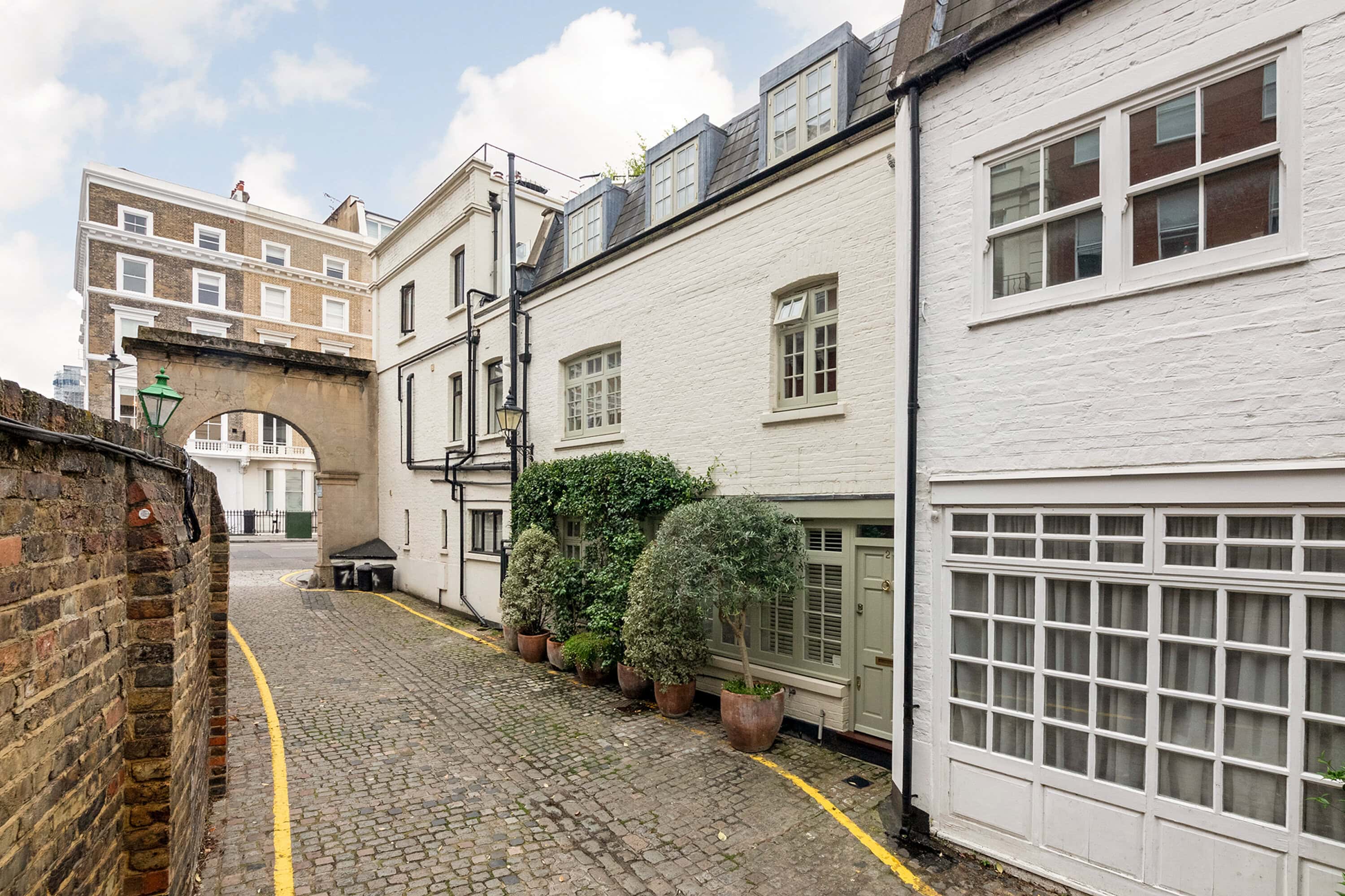 A mews property in Kynance Mews with shrubbery on the exterior of the house