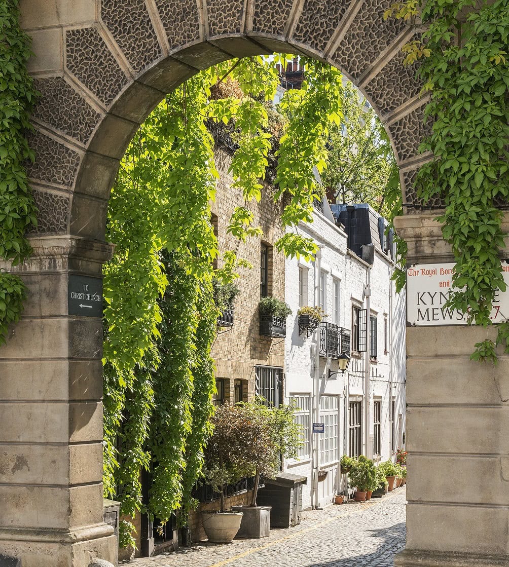 An arch in Kynance Mews showcasing a mews property