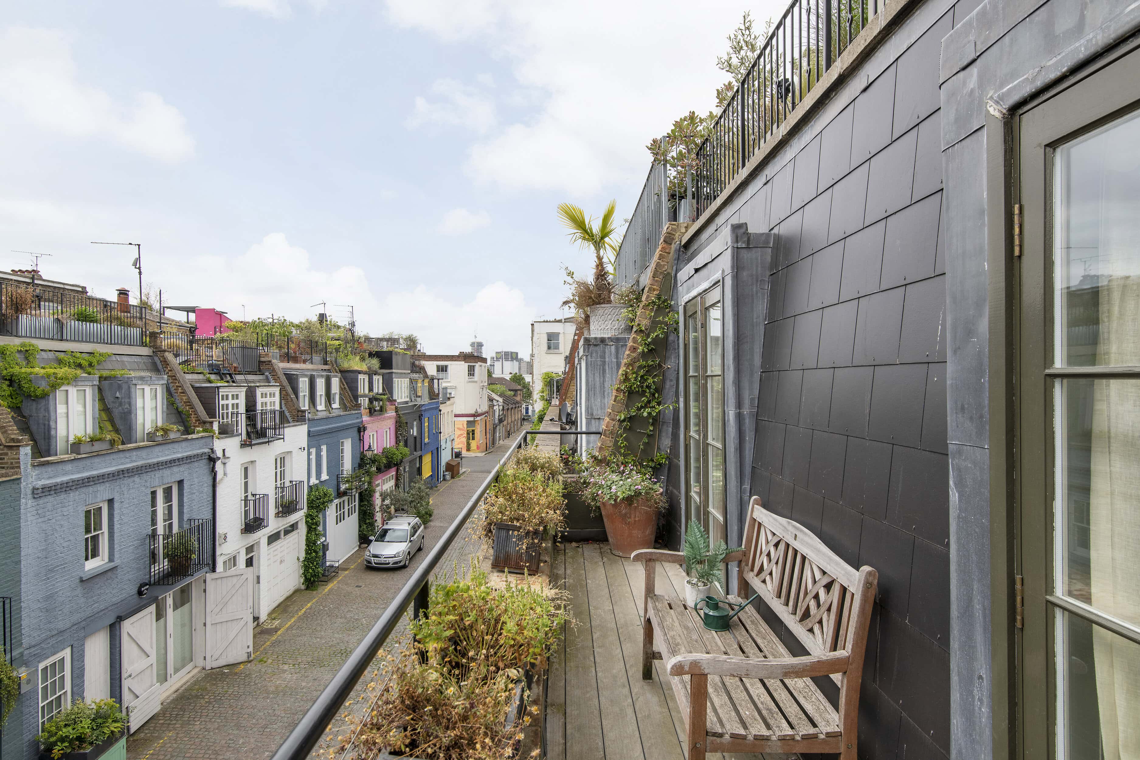 A rooftop terrace overlooking a mews street for renting
