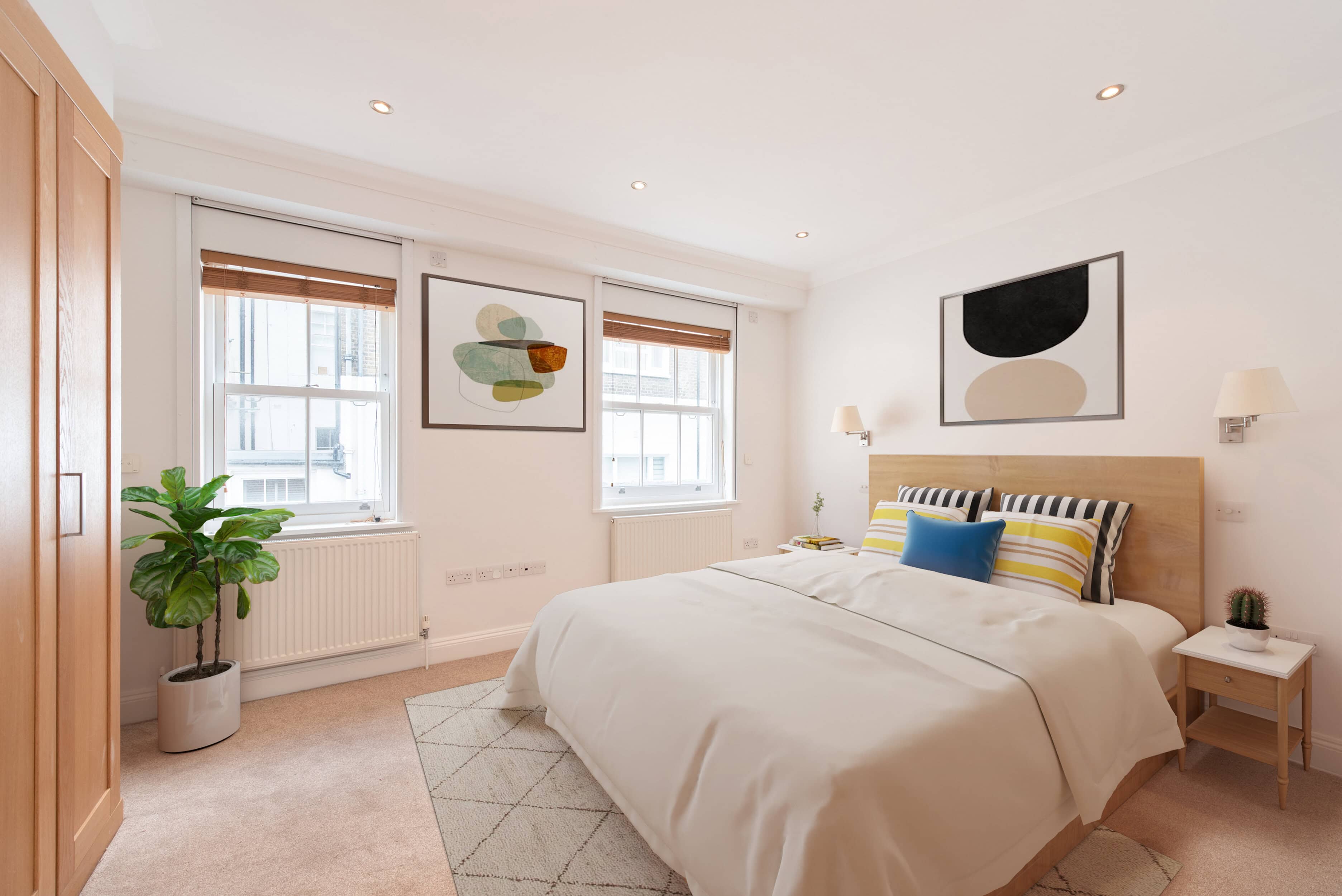 A bedroom of a mews property