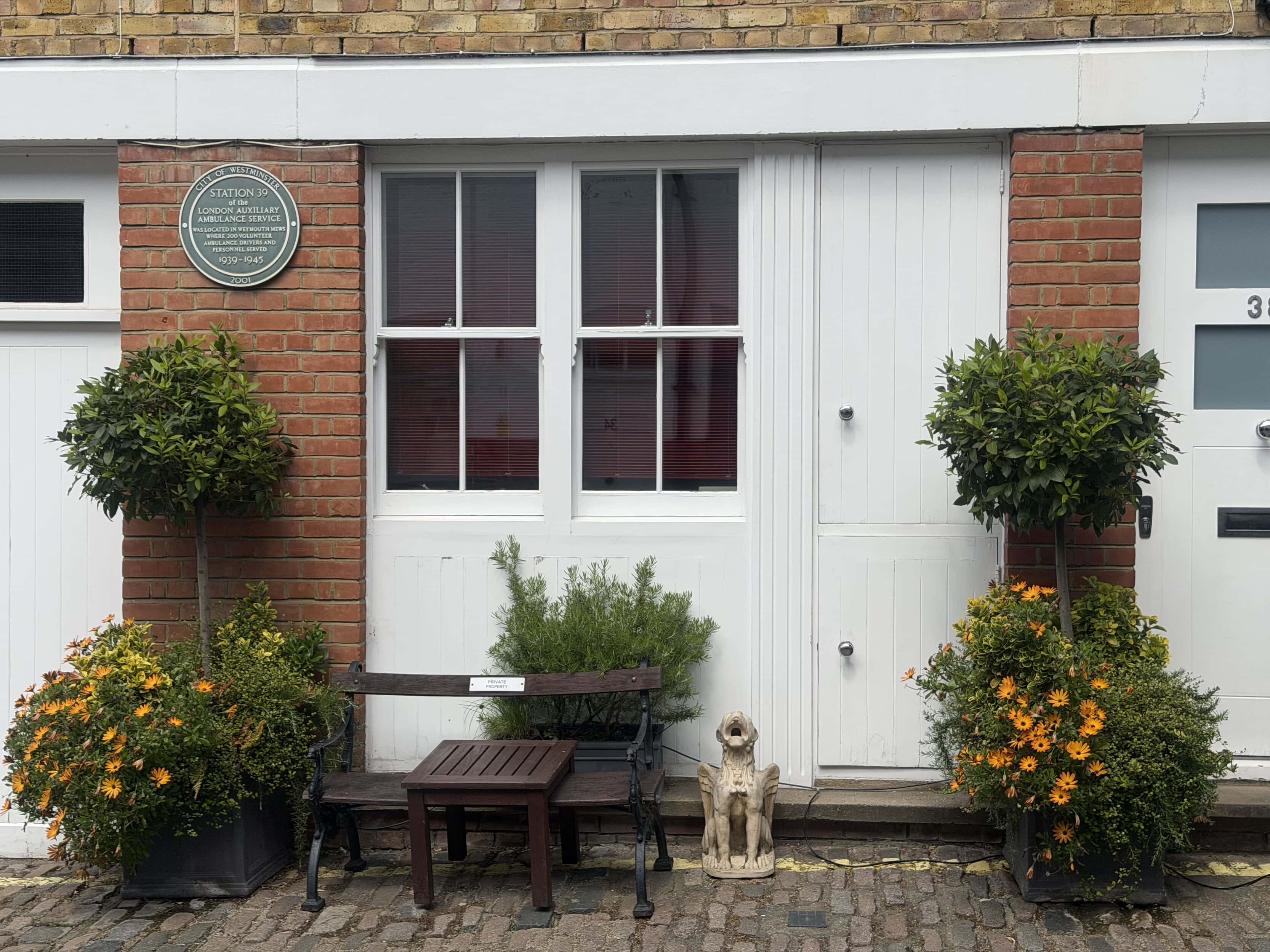 A plaque for Weymouth Mews
