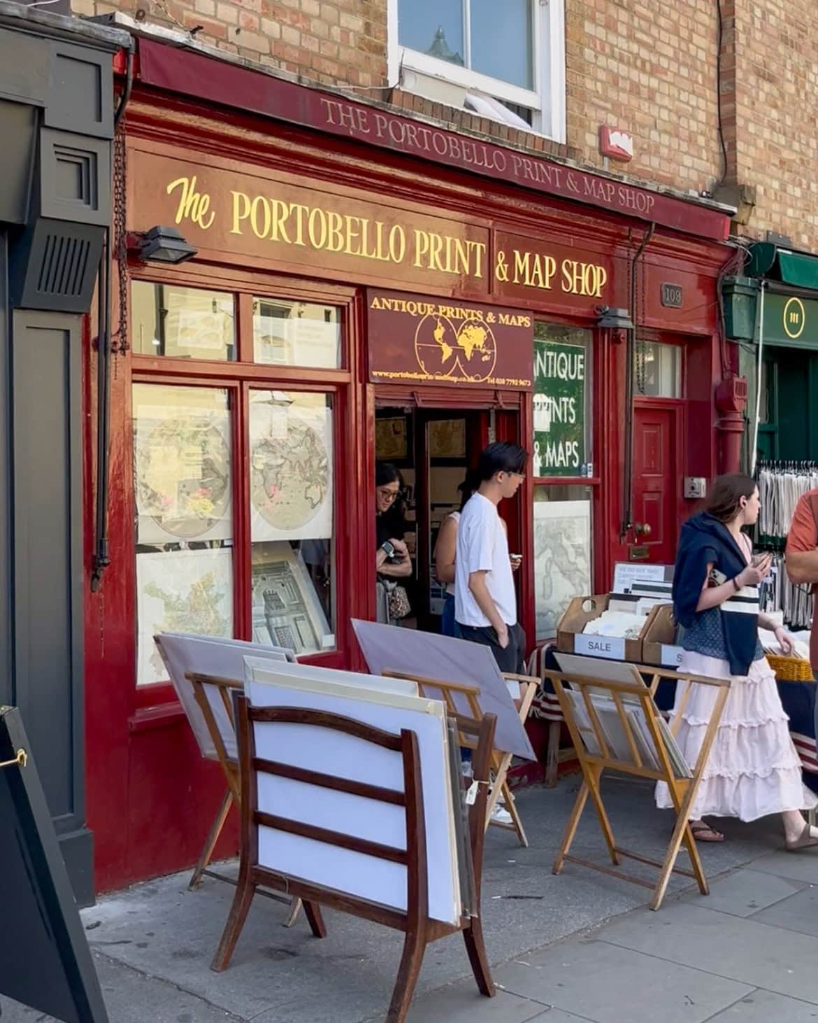 Historic Portobello Print & Map Shop on a lively London street. Shopping on Portobello Road is a unique experience and one that attracts those looking to buy in Notting Hill.