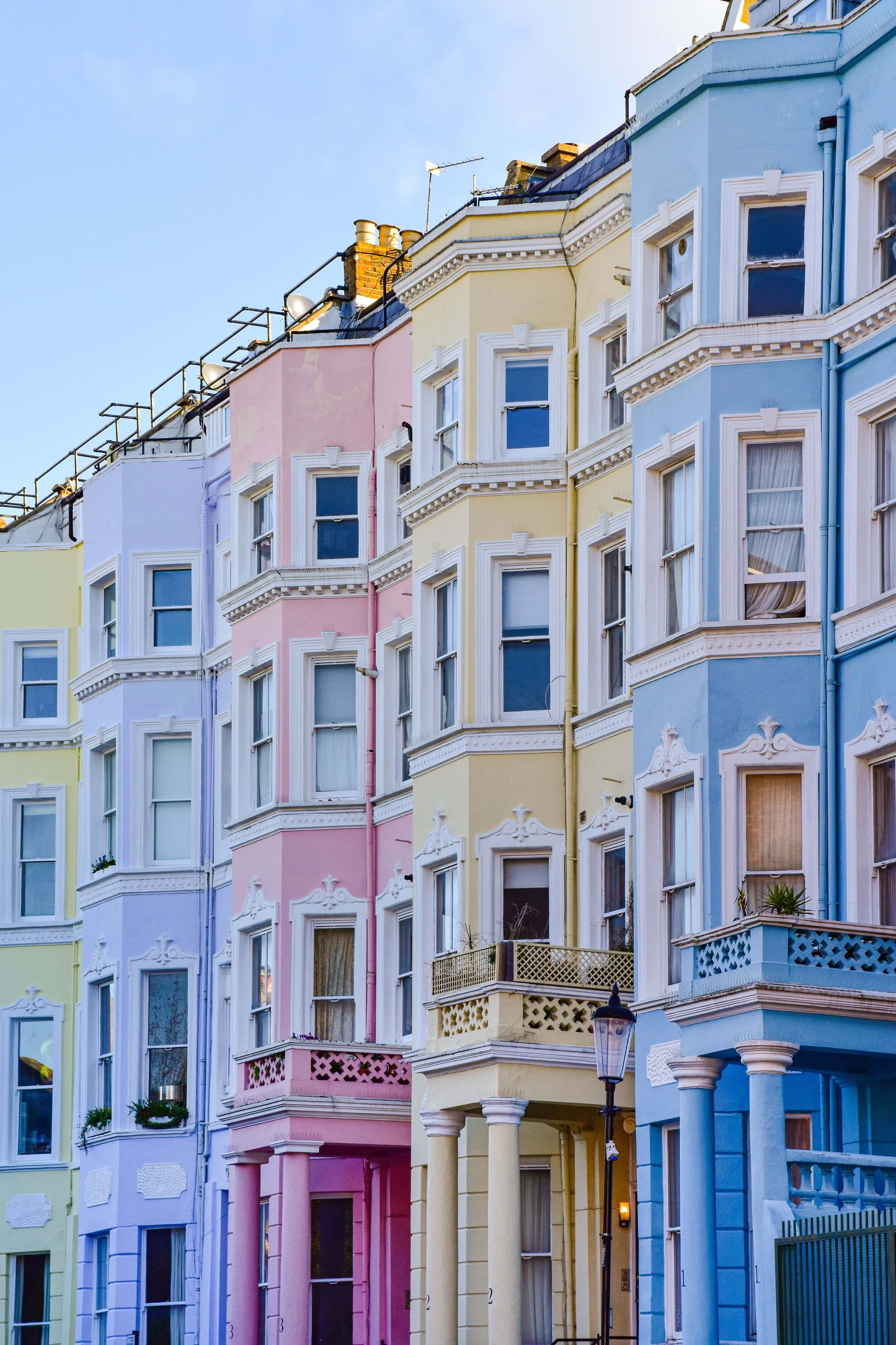 Vibrant pastel Victorian houses in Notting Hill, London, ideal for those who want to rent in Notting Hill