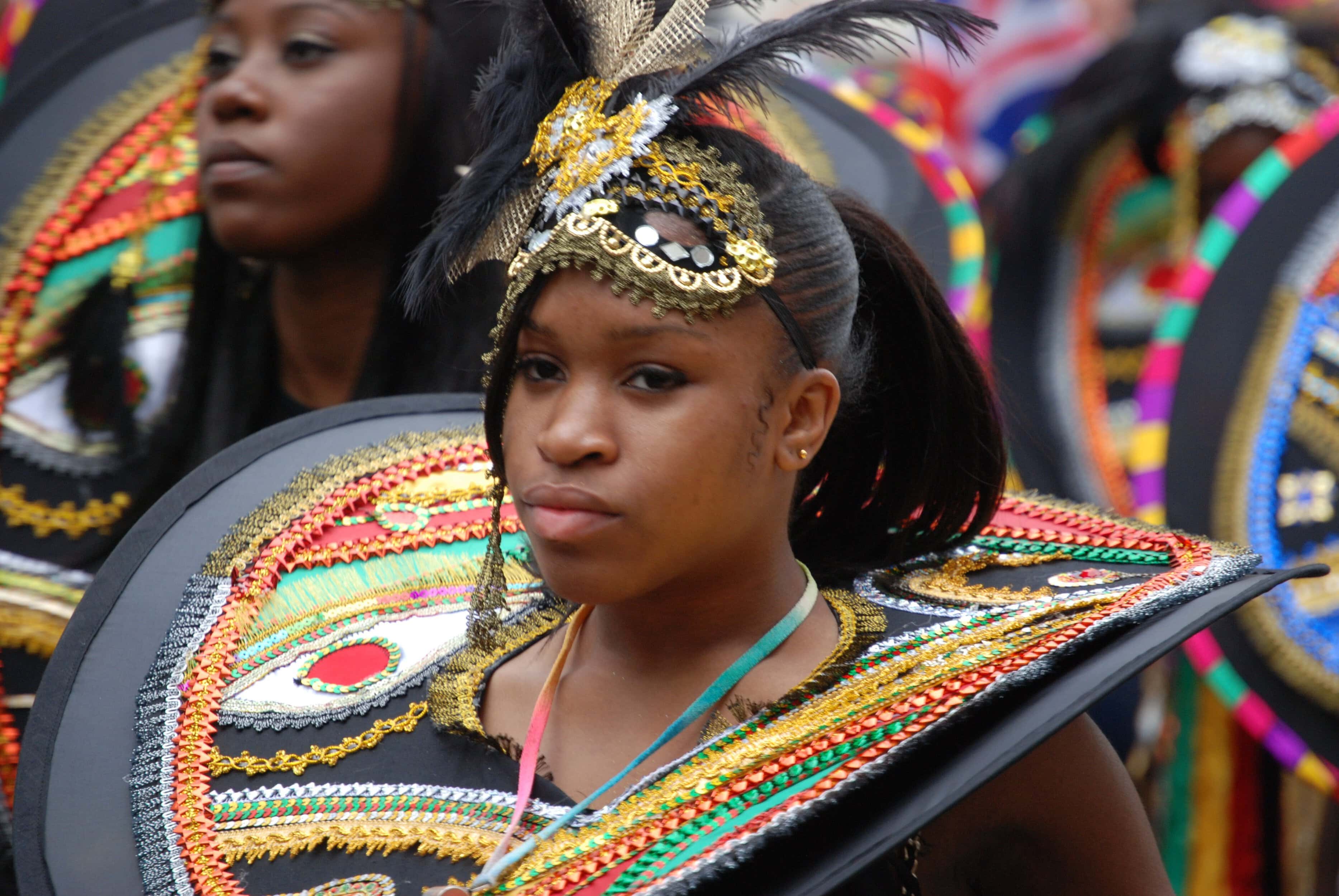 Young woman at the Notting Hill Carnival. The vibrant culture is one of the main facets that attracts those looking to buy in Notting Hill.